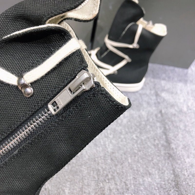 high top black canvas sneakers with wrap around laces high top black canvas sneakers with wrap around laces