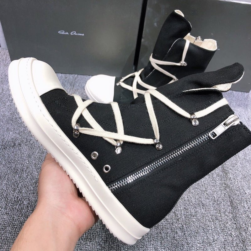 high top black canvas sneakers with wrap around laces high top black canvas sneakers with wrap around laces