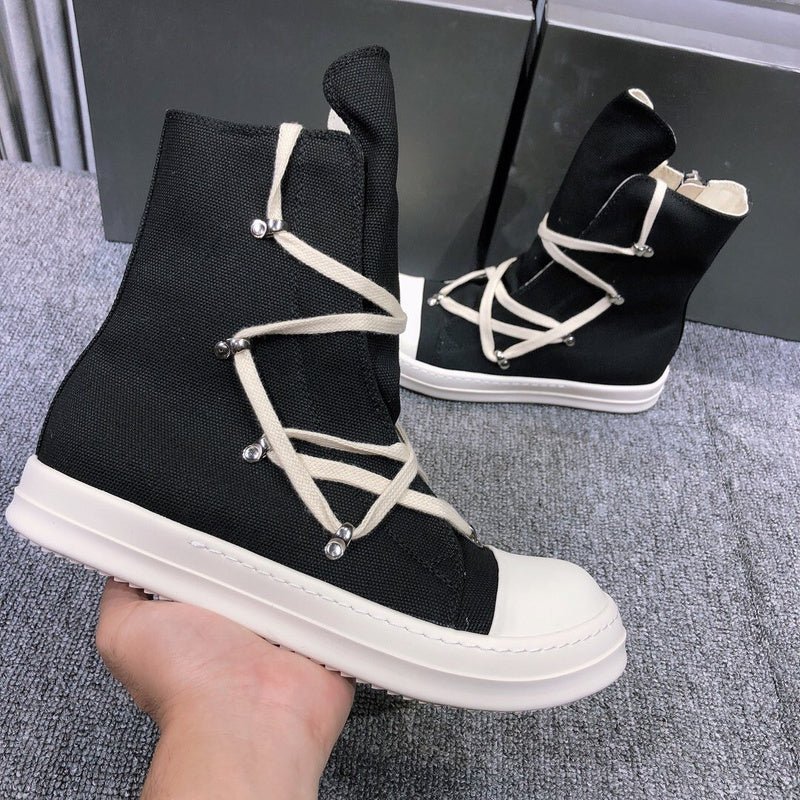 high top black canvas sneakers with wrap around laces high top black canvas sneakers with wrap around laces