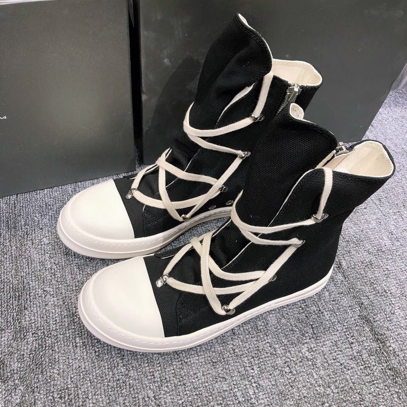 high top black canvas sneakers with wrap around laces high top black canvas sneakers with wrap around laces