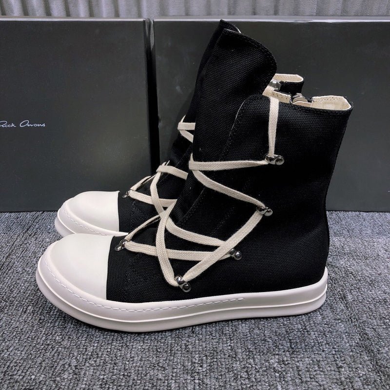 high top black canvas sneakers with wrap around laces high top black canvas sneakers with wrap around laces