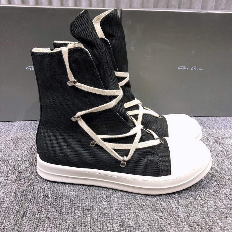 high top black canvas sneakers with wrap around laces high top black canvas sneakers with wrap around laces