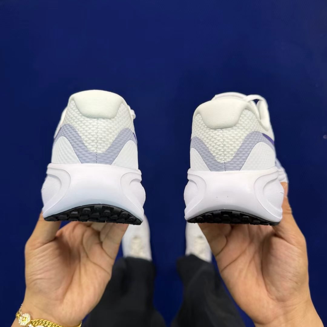 nike revolution in white/lavender: ethereal momentum nike revolution in white/lavender: ethereal momentum