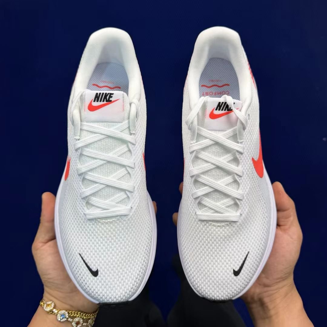 nike revolution 7 in white with red tab: essential contrast nike revolution 7 in white with red tab: essential contrast